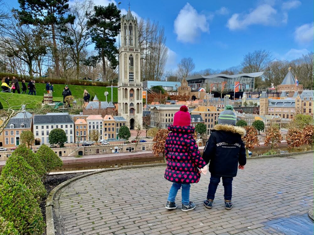 Children exploring miniature Dutch landmarks at Madurodam in The Hague