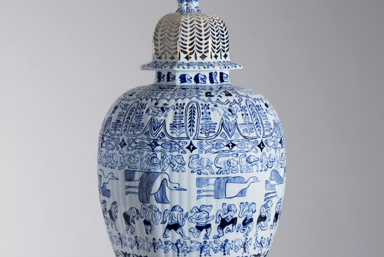 Detailed hand-painted blue and white Delftware lidded vase